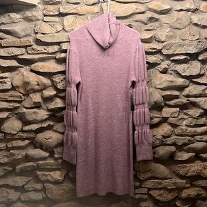 Sweater dress. Bubble detail in sleeves. Turtle neck.